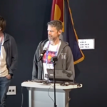 Jeremy Saxey presenting at Eth Denver in front of an audience about the Rocket School project.